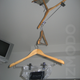 Illustration for article titled iPhone Hangers Stand Would Make MacGyver Proud—If He Ever Stops Laughing
